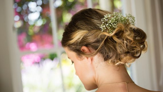 close-up-rear-view-of-bride-hair-with-flowers-2026-03-26-11-50-43-utc