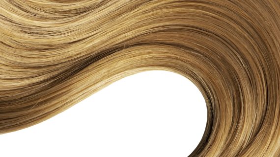 Long wavy blond hair on white